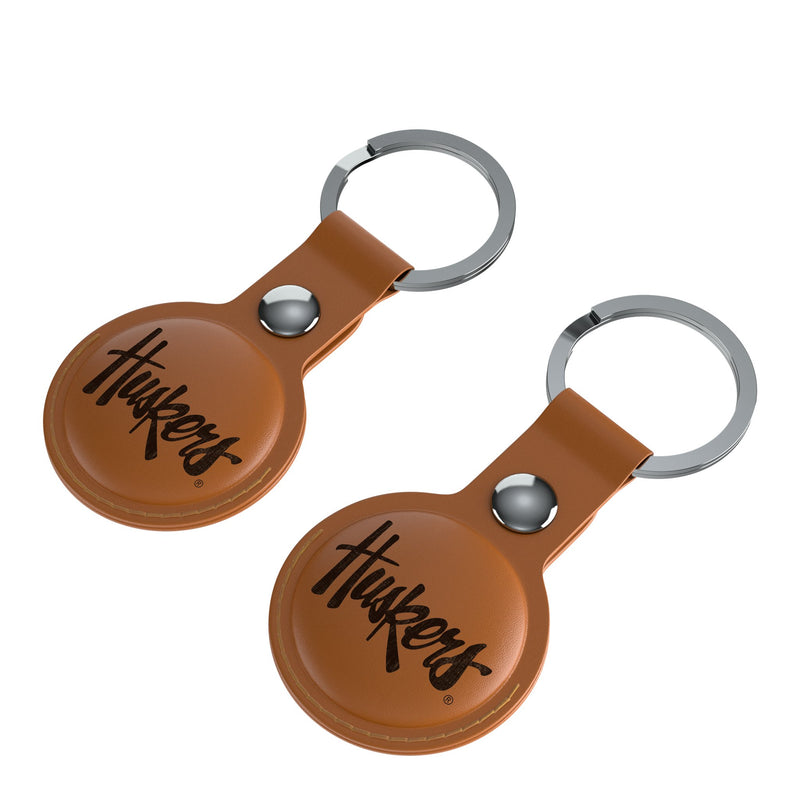 University of Nebraska Huskers Burn AirTag Brown Airtag Holder 2-Pack Iso.Jpg